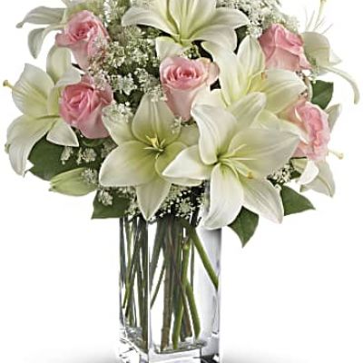 <div id="mark-3" class="m-pdp-tabs-marketing-description">Stunning in its simplicity, this innocent harmony of light pink roses and snow white lilies are a heartfelt way to send your very best. The classic, clear rectangular glass vase keeps the focus on the heavenly beauty of the blooms.</div>
&nbsp;
<div id="desc-3">
<ul>
 	<li>Light pink roses and white asiatic lilies form a fragrant bouquet with delicate touches of Queen Anne's lace and rich green salal.</li>
</ul>
</div>