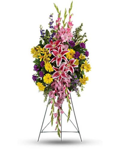 <div id="mark-1" class="m-pdp-tabs-marketing-description">Your sincere wishes for peace and harmony resonate beautifully in this perfectly balanced arrangement of pink lilies, yellow gerberas and purple larkspur.</div>
<div id="desc-1">
<ul>
<li>This inspiring spray includes pink stargazer lilies, yellow gerberas, yellow alstroemeria, pink gladioli, purple carnations and purple larkspur accented with oregonia and lemon leaf.</li>
</ul>
</div>