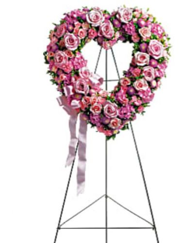 <div id="mark-1" class="m-pdp-tabs-marketing-description">In the shape of a heart, and accented with a pink satin ribbon, this garden of delicate blooms is a tender and classic tribute to a precious life, and a cherished expression of love and sympathy.</div>
<div id="desc-1">
<ul>
<li>Beautiful flowers such as light pink roses, hydrangea and miniature carnations mix with lavender chrysanthemums on an open heart-shaped wreath.</li>
</ul>
</div>