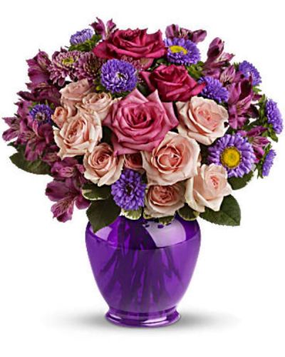 <p>Elegance without extravagance, this magnificent bouquet features a gorgeous blend of pink roses and lavender favorites in a classic ginger jar of translucent purple. The effect is stunning!<br />
The elegant bouquet includes hot pink roses, light pink spray roses, lavender alstroemeria, lavender matsumoto asters and lavender cushion spray chrysanthemums accented with fresh greenery.</p>