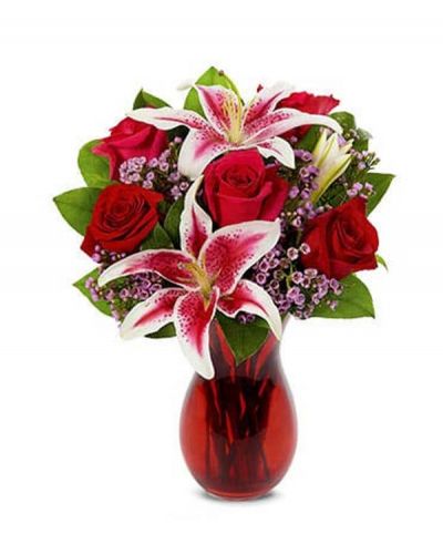<p>Celebrate your favorite Love Story. Make their heart skip a beat with this romantic bouquet of roses, stargazer lilies and waxflower artfully arranged in a gorgeous vase.</p>