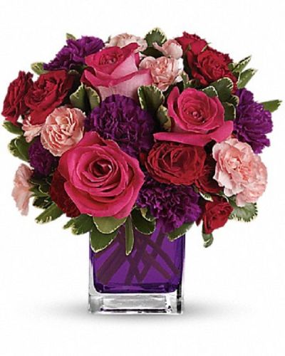 <div class="m-pdp-tabs-description">
<div id="mark-1" class="m-pdp-tabs-marketing-description">Pure romance. Hot pink roses and dark red spray roses are brightly arranged inside a glass cube.</div>
</div>
<p id="arrngDescp">Pink roses, dark red  roses, purple carnations and pink miniature carnations are accented with assorted greens.</p>