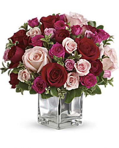 Sing them a love song - with flowers. This lush, loving rose arrangement tells them just how much you care.
