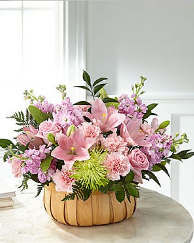 <p>Let them know how much you care with a gorgeous bouquet that features carnations, stock, roses, lilies and Fuji mums. Each bloom is a thoughtful reminder of your support and love, while sitting in a beautifully crafted basket.</p>