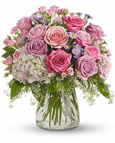 <div class="m-pdp-tabs-description">
<div id="mark-1" class="m-pdp-tabs-marketing-description">This softly elegant gesture of gentle colors that is perfect for any occasion.</div>
</div>
<p id="arrngDescp">Lavender and pink flowers such as roses, hydrangea, monte cassino asters, eucalyptus and salal are arranged in a clear glass vase.</p>