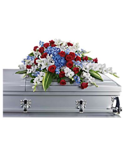 <div id="mark-1" class="m-pdp-tabs-marketing-description">For a military or private funeral, this classic half-couch casket spray is a proud and patriotic way to pay lasting tribute to an loved one's esteemed memory, life of service and dedication to freedom.</div>
<div id="desc-1">
<ul>
<li>Bold flowers such as blue hydrangea and delphinium, classic red roses, and white oriental lilies and gladioli form an all-American display honoring the deceased and their love of country.</li>
</ul>
</div>