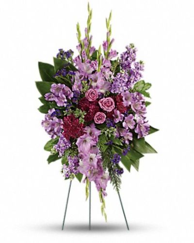 <div class="m-pdp-tabs-description">
<div id="mark-1" class="m-pdp-tabs-marketing-description" style="text-align: right;">Console and comfort with this luxurious spray of lavender roses, alstroemeria and gladioli. It's a majestic way to remember the departed at the memorial service.</div>
</div>
<p id="arrngDescp">This regal spray includes lavender roses, lavender alstroemeria, lavender gladioli, lavender stock, purple cushion spray chrysanthemums, purple sinuata statice, green ti leaves, flat cedar, oregonia and lemon leaf.</p>