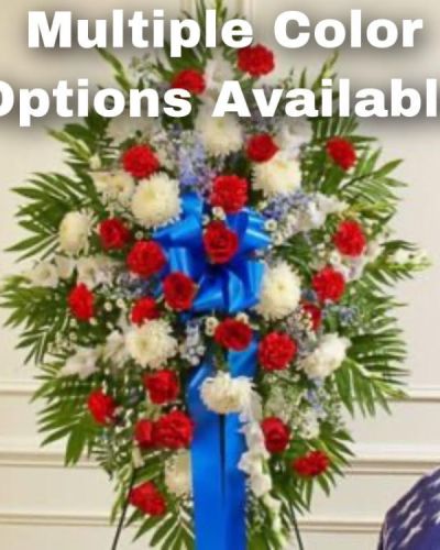 <p>&nbsp;</p>
<hr />
<p>Honor a beloved veteran for their dedicated service with this heartfelt patriotic arrangement. Meticulously crafted by our expert florists using the freshest blooms, it perfectly conveys all the love, pride and sympathy you feel in your heart. This standing spray arrangement features fresh red, white and blue flowers such as roses, football mums, gladiolas, delphiniums, carnations and more. Appropriate for family, friends and business associates to send directly to the funeral home.</p>
<h1>$<span style="color: #0000ff;">199.94</span></h1>
<hr />
<h1></h1>
