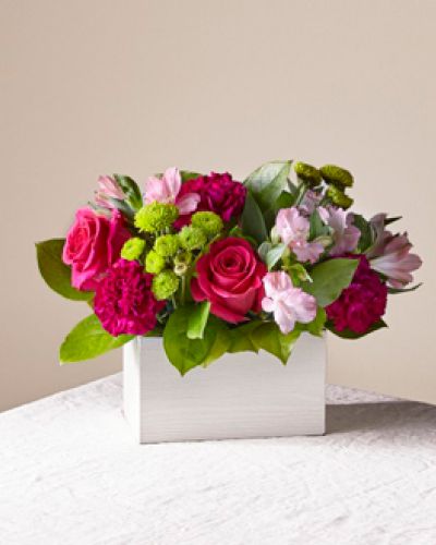 <p><strong>Bright pink blooms mingle among an assortment of lush greenery to create Watermelon Punch. As the weather warms up, give this vibrant floral arrangement to brighten up a friend's home, say thank you or simply celebrate the season.</strong></p>