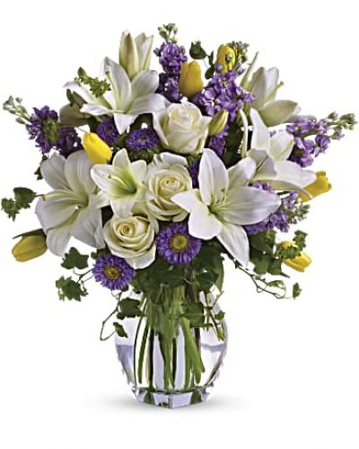 <div id="mark-3" class="m-pdp-tabs-marketing-description">Dance into spring! Send this bouquet of favorite spring flowers to brighten someone's day with the playful beauty of nature. Such a pretty way to say, "I'm thinking of you!"</div>
<p>&nbsp;</p>
<div id="desc-3">
<ul>
<li>This white, lavender and yellow bouquet includes white asiatic lilies, cream roses, yellow tulips, lavender stock, lavender matsumoto asters and greens including bupleurum, ivy and seeded eucalyptus.</li>
</ul>
</div>