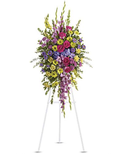 <div id="mark-1" class="m-pdp-tabs-marketing-description">This bright spray of purple, lavender, pink and yellow flowers is a thoughtful way to celebrate a beautiful life.</div>
<div id="desc-1">
<ul>
<li>Vibrant blossoms such as purple hydrangea and asters, lavender chrysanthemums and gladioli, plus pink roses, yellow carnations, snapdragons and chrysanthemums.</li>
</ul>
</div>