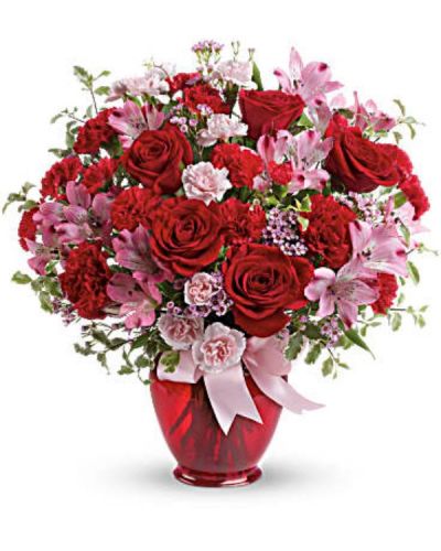 <div id="mark-3" class="m-pdp-tabs-marketing-description">Love is bliss! Celebrate your special connection with this romantic bouquet of red roses mixed with flirty pink blooms. Arranged in a red jar and tied up with a bow, it's a loving way to make her feel extra special, on Valentine's Day or any day of the year!</div>
<div id="desc-3">
<ul>
<li>Lush red roses, pink alstroemeria, red carnations, miniature red carnations, miniature pink carnations and pink waxflower are arranged with pitta negra and lemon leaf.</li>
</ul>
</div>