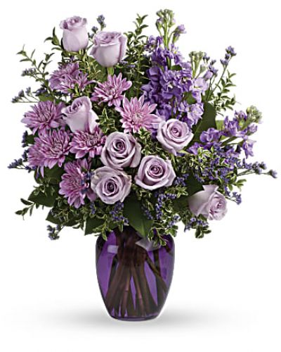 <hr />
<hr />
<div id="mark-3" class="m-pdp-tabs-marketing-description">The perfect pick for the purple lover in your life! This impressive bouquet charms with roses, stock and mums. Presented in a gorgeous glass vase.</div>
<div id="desc-3">
<ul>
<li>This dramatic arrangement includes lavender roses, lavender stock, lavender cushion spray chrysanthemums, lavender limonium, oregonia and lemon leaf</li>
</ul>
</div>